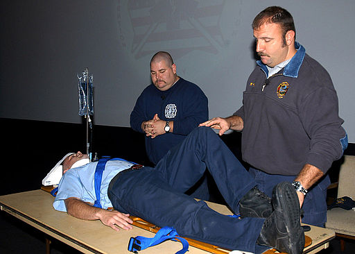 Firefighters/paramedics simulate medical procedures