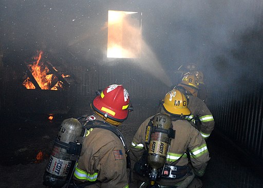 Firefighters using hydraulic ventilation 