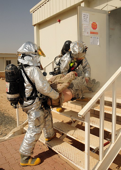 Firefighters remove a simulated victim